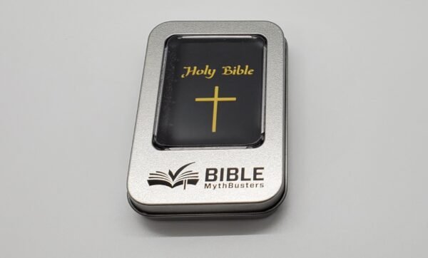 A small rectangular metal tin with a clear lid displays a black "Hope Drive: Seminar Files and Audio Bible" card in gold text above a gold cross. The tin features the Bible MythBusters logo, open book icon, and is set against a plain white background.